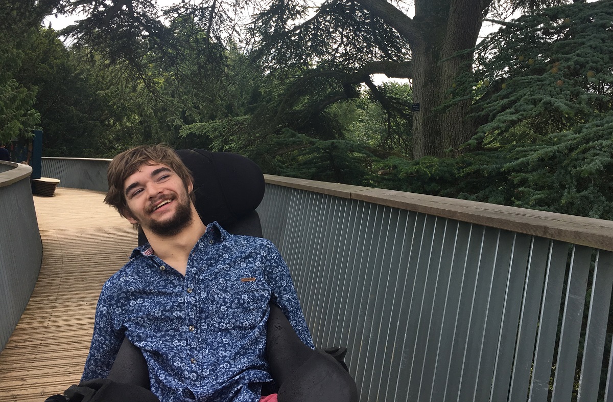 Photo of Marchant on the bridge at Westonbirt Arboretum.